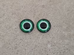 2 st drakögon kattögon i glas, glasinfattningar, cabochoner (12 mm)