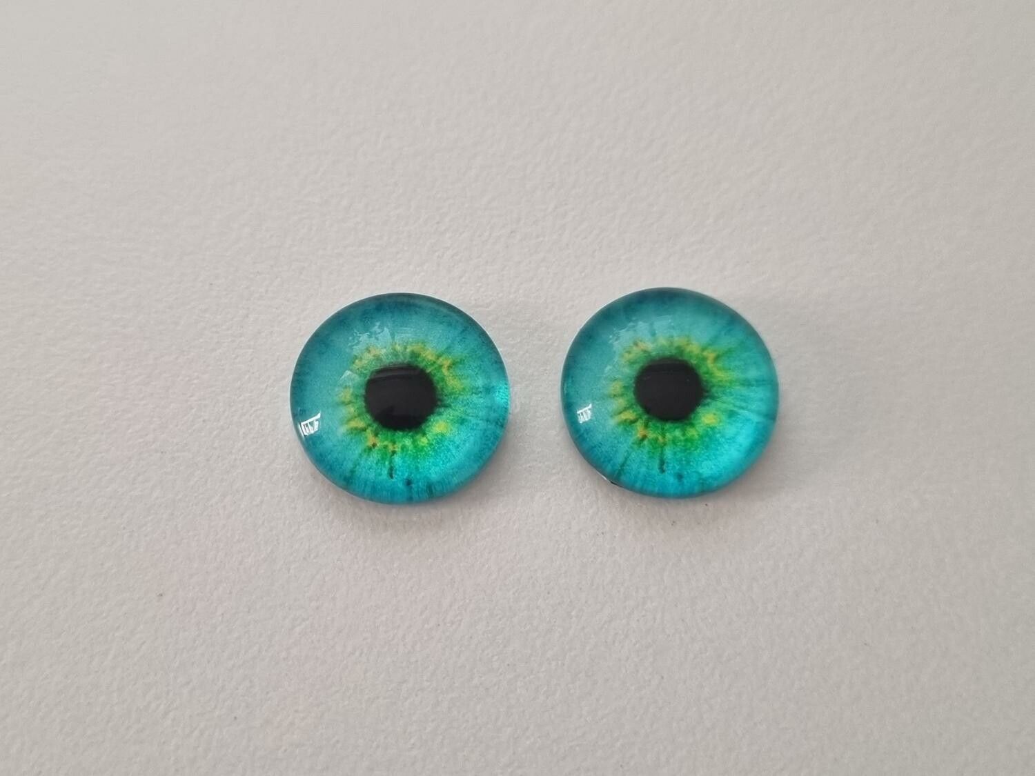 2 st drakögon kattögon i glas, glasinfattningar, cabochoner (12 mm)