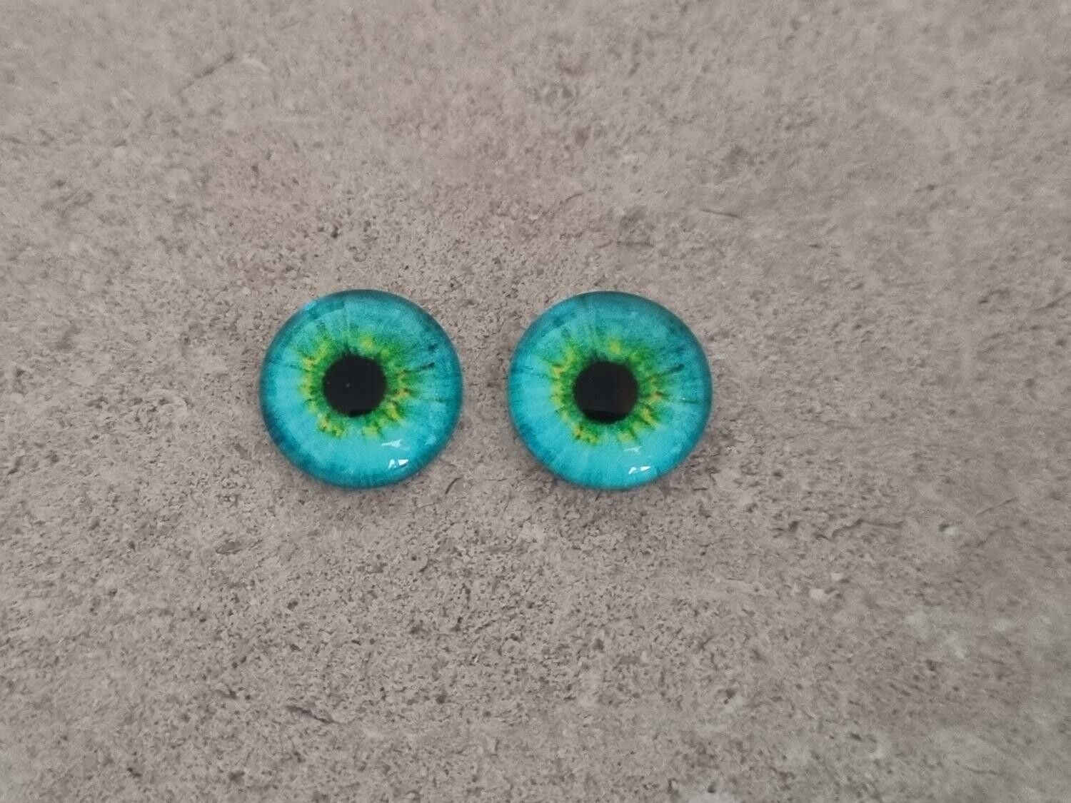 2 st drakögon kattögon i glas, glasinfattningar, cabochoner (12 mm)