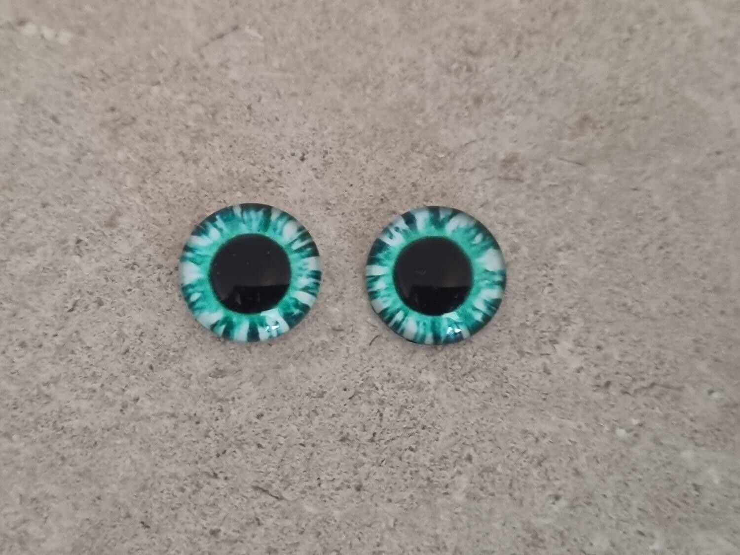 2 st drakögon kattögon i glas, glasinfattningar, cabochoner (12 mm)