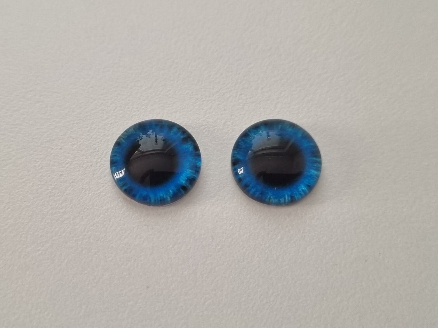 2 st drakögon kattögon i glas, glasinfattningar, cabochoner (12 mm)