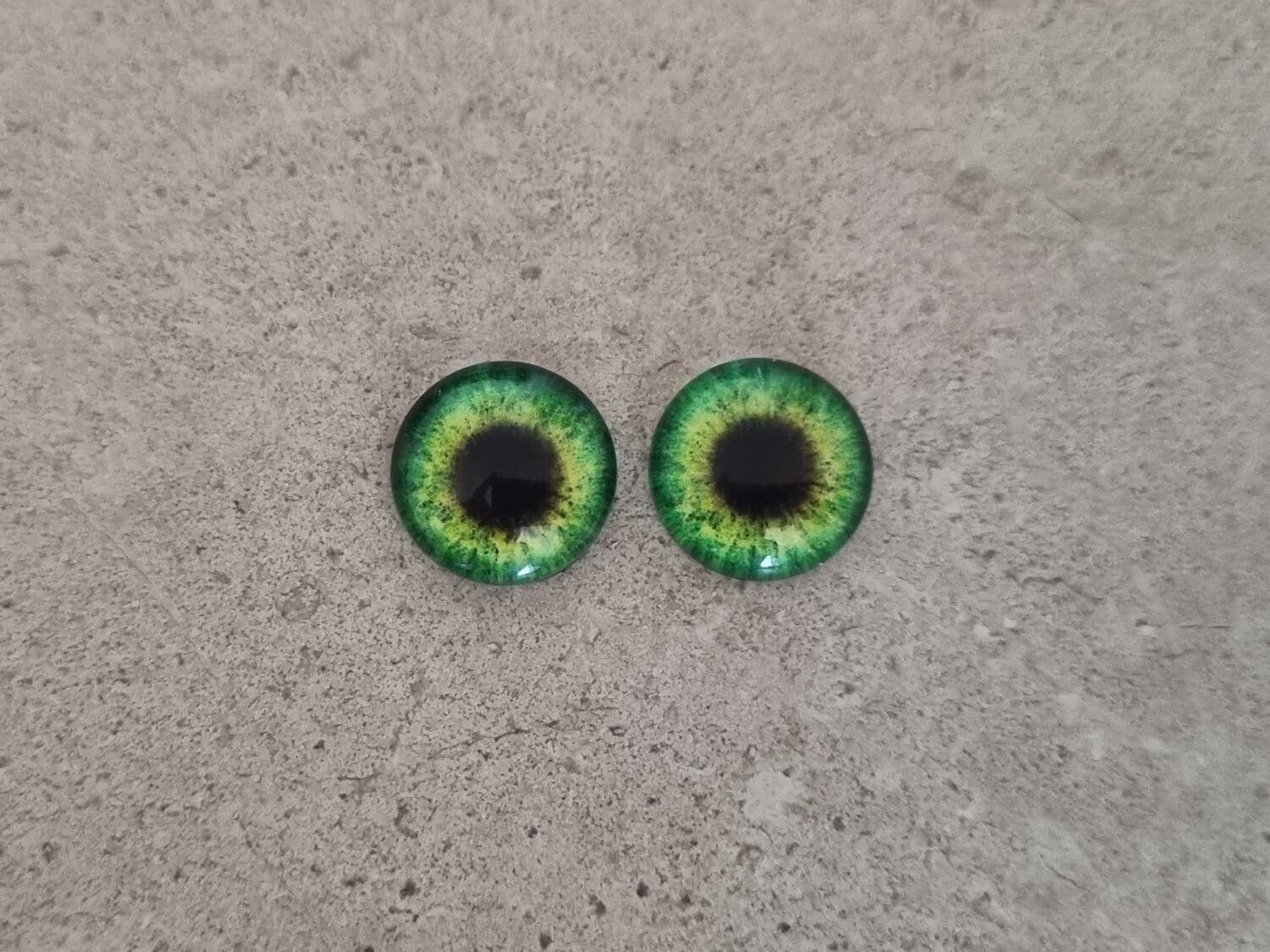 2 st drakögon kattögon i glas, glasinfattningar, cabochoner (12 mm)