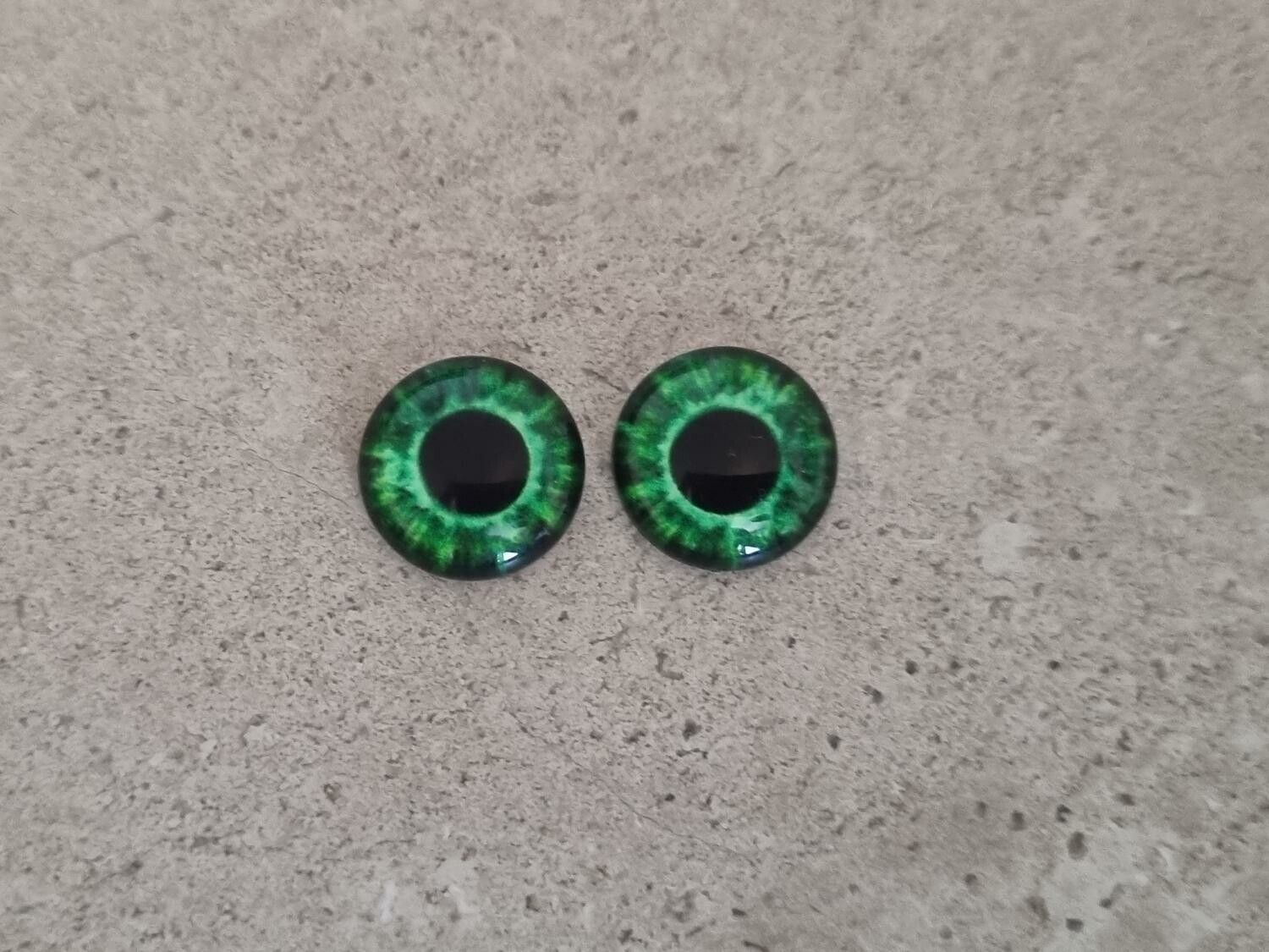 2 st drakögon kattögon i glas, glasinfattningar, cabochoner (12 mm)