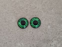 2 st drakögon kattögon i glas, glasinfattningar, cabochoner (12 mm)