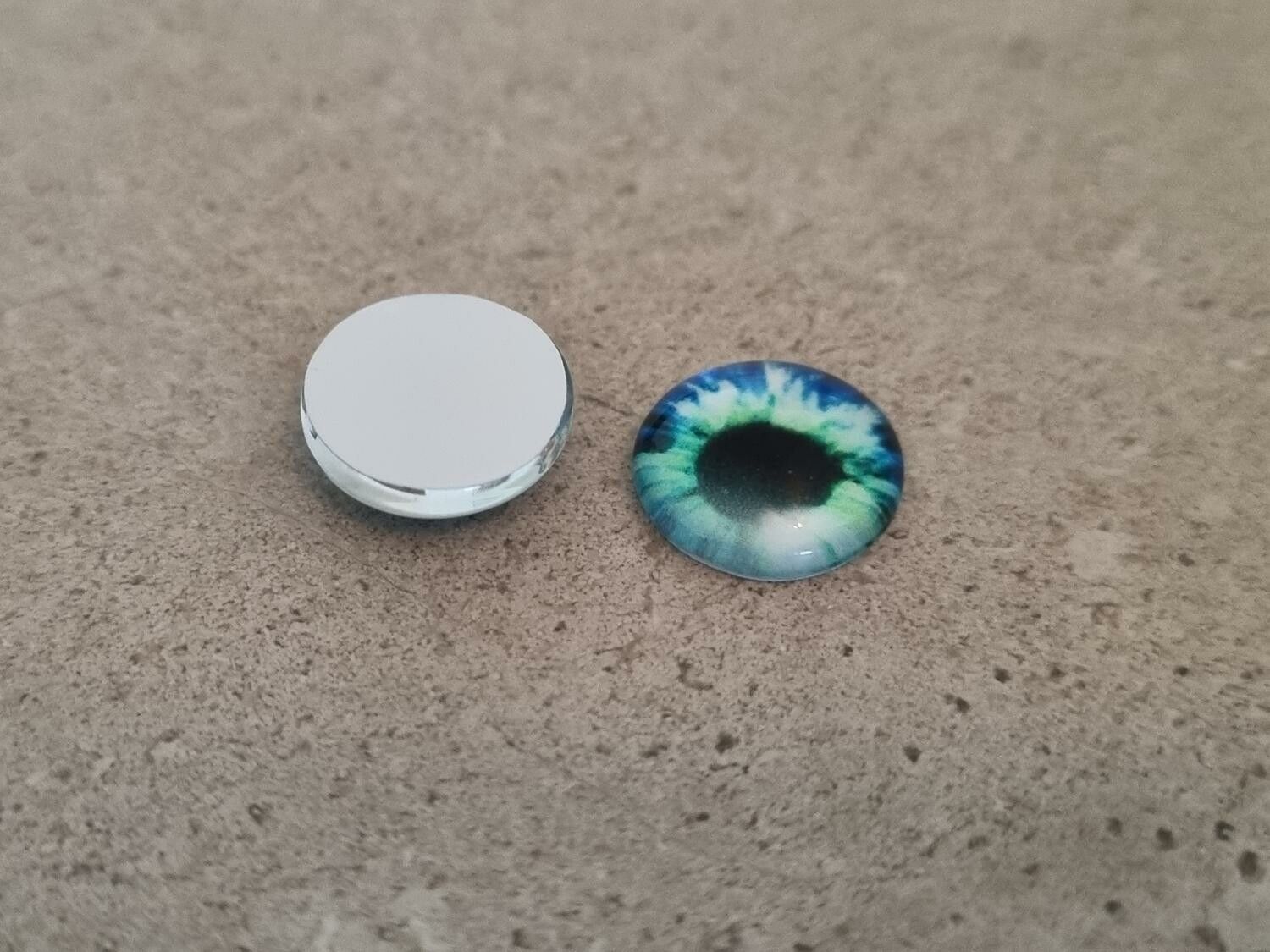 2 st drakögon kattögon i glas, glasinfattningar, cabochoner (12 mm)