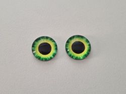 2 st drakögon kattögon i glas, glasinfattningar, cabochoner (12 mm)