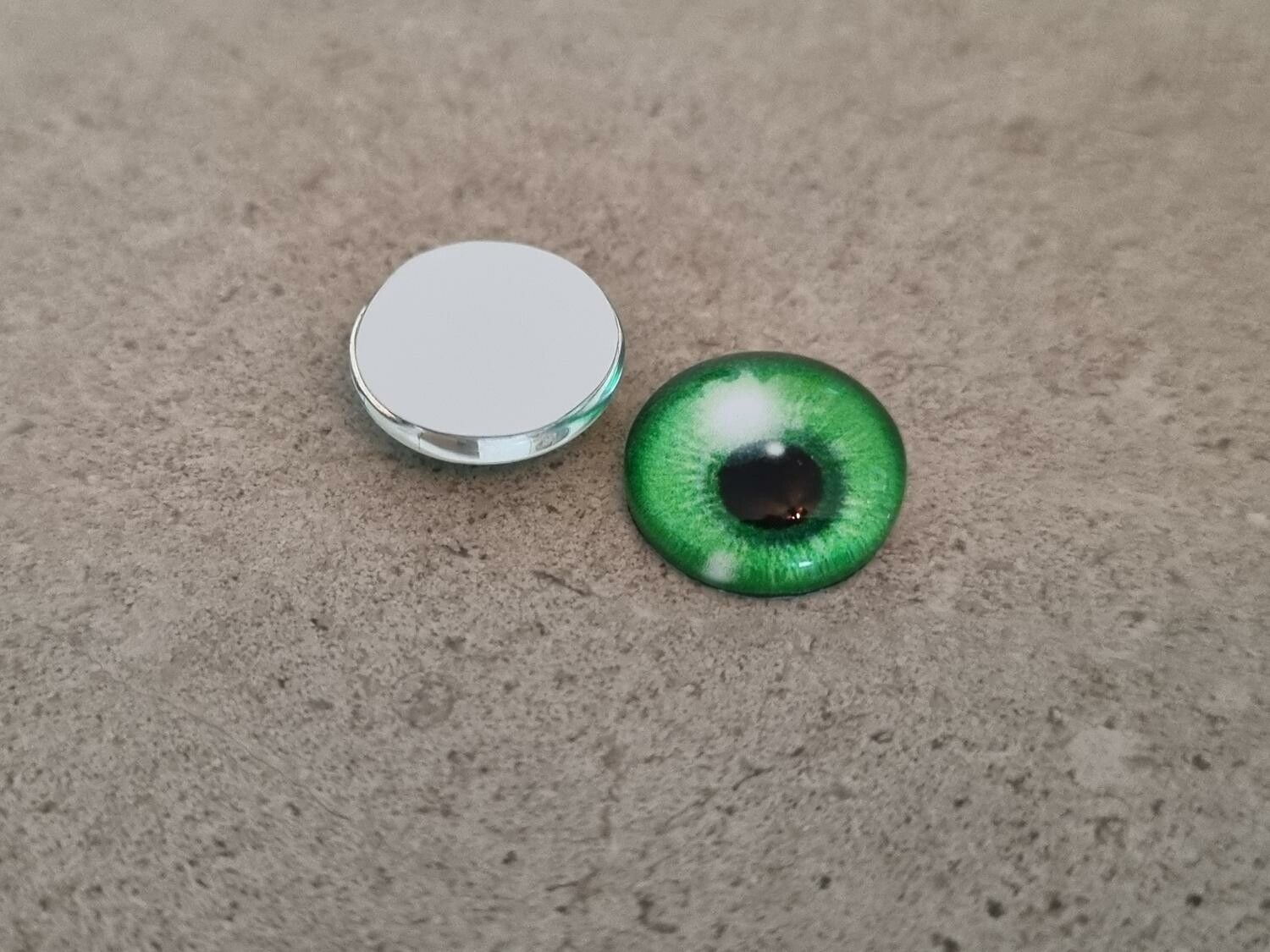 2 st drakögon kattögon i glas, glasinfattningar, cabochoner (12 mm)