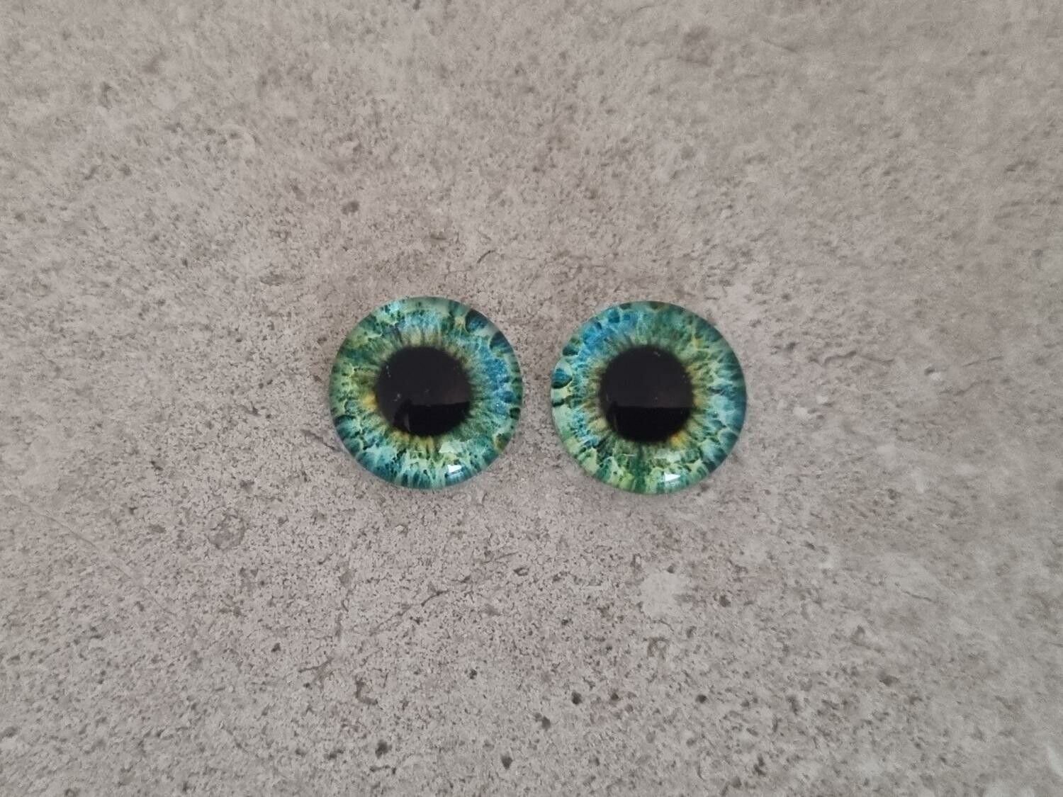 2 st drakögon kattögon i glas, glasinfattningar, cabochoner (12 mm)