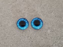 2 st drakögon kattögon i glas, glasinfattningar, cabochoner (12 mm)