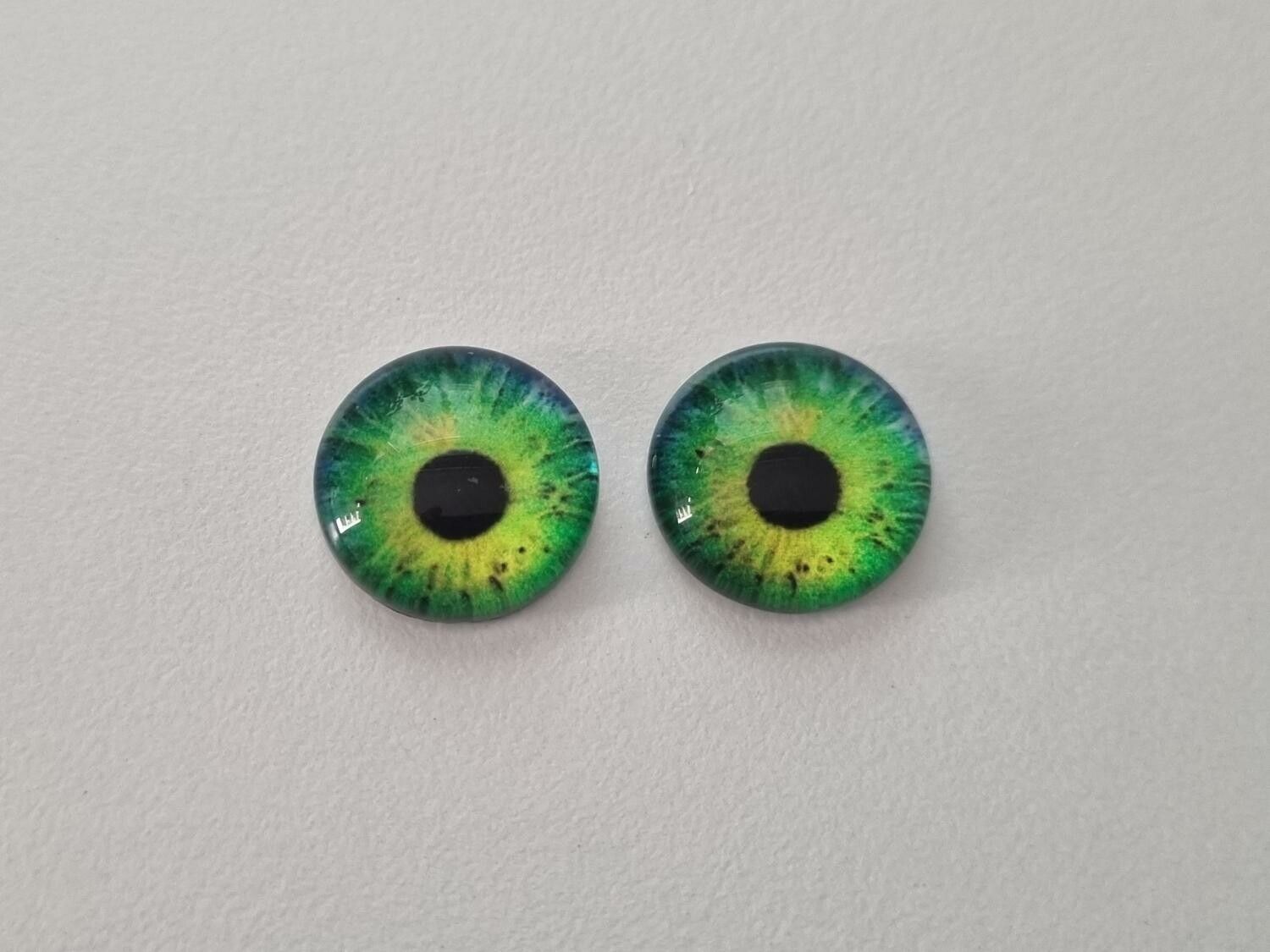 2 st drakögon kattögon i glas, glasinfattningar, cabochoner (12 mm)