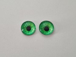 2 st drakögon kattögon i glas, glasinfattningar, cabochoner (12 mm)