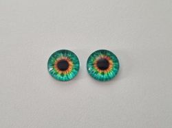 2 st drakögon kattögon i glas, glasinfattningar, cabochoner (12 mm)
