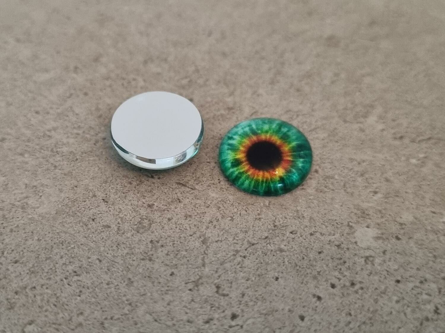 2 st drakögon kattögon i glas, glasinfattningar, cabochoner (12 mm)