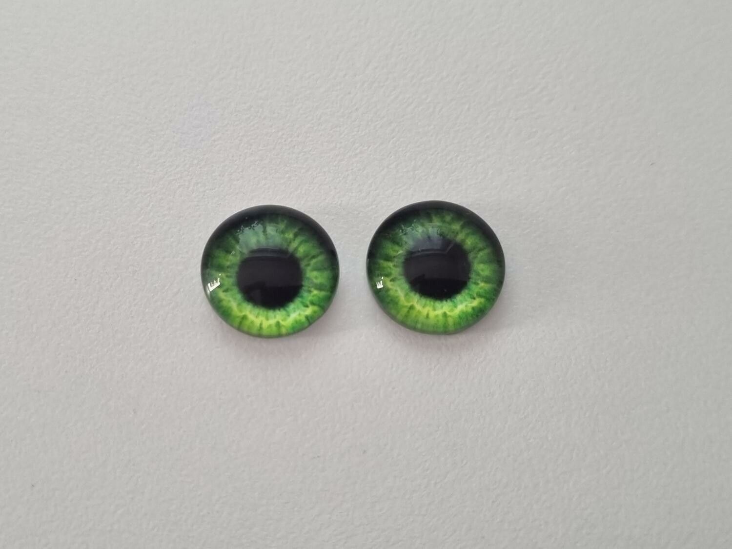 2 st drakögon kattögon i glas, glasinfattningar, cabochoner (12 mm)