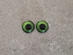 2 st drakögon kattögon i glas, glasinfattningar, cabochoner (12 mm)