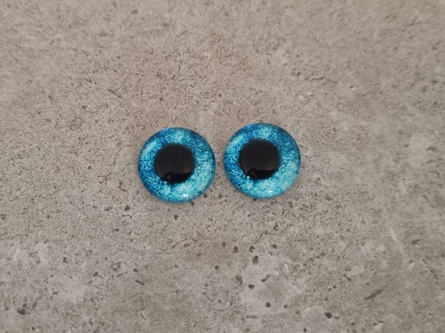 2 st drakögon kattögon i glas, glasinfattningar, cabochoner (12 mm)