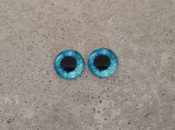 2 st drakögon kattögon i glas, glasinfattningar, cabochoner (12 mm)