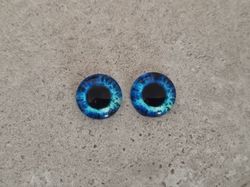 2 st drakögon kattögon i glas, glasinfattningar, cabochoner (12 mm)