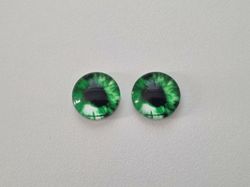 2 st drakögon kattögon i glas, glasinfattningar, cabochoner (12 mm)