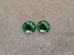 2 st drakögon kattögon i glas, glasinfattningar, cabochoner (12 mm)