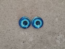 2 st drakögon kattögon i glas, glasinfattningar, cabochoner (12 mm)