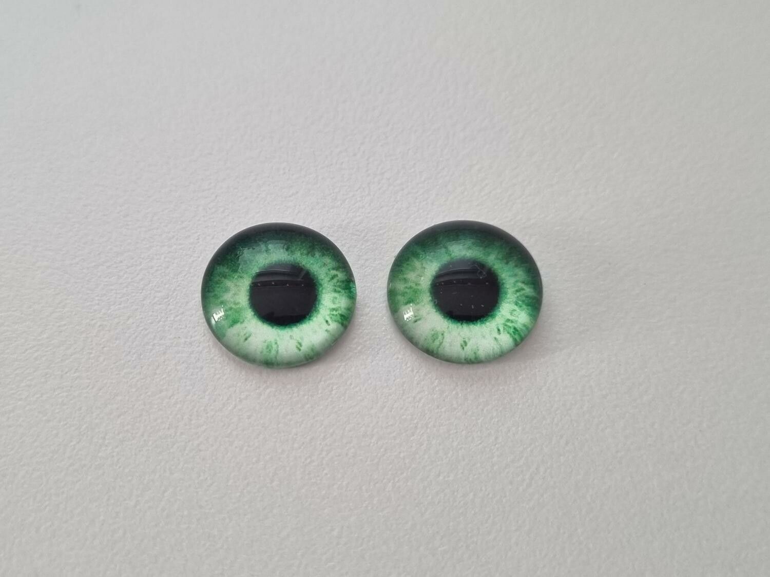 2 st drakögon kattögon i glas, glasinfattningar, cabochoner (12 mm)