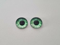 2 st drakögon kattögon i glas, glasinfattningar, cabochoner (12 mm)
