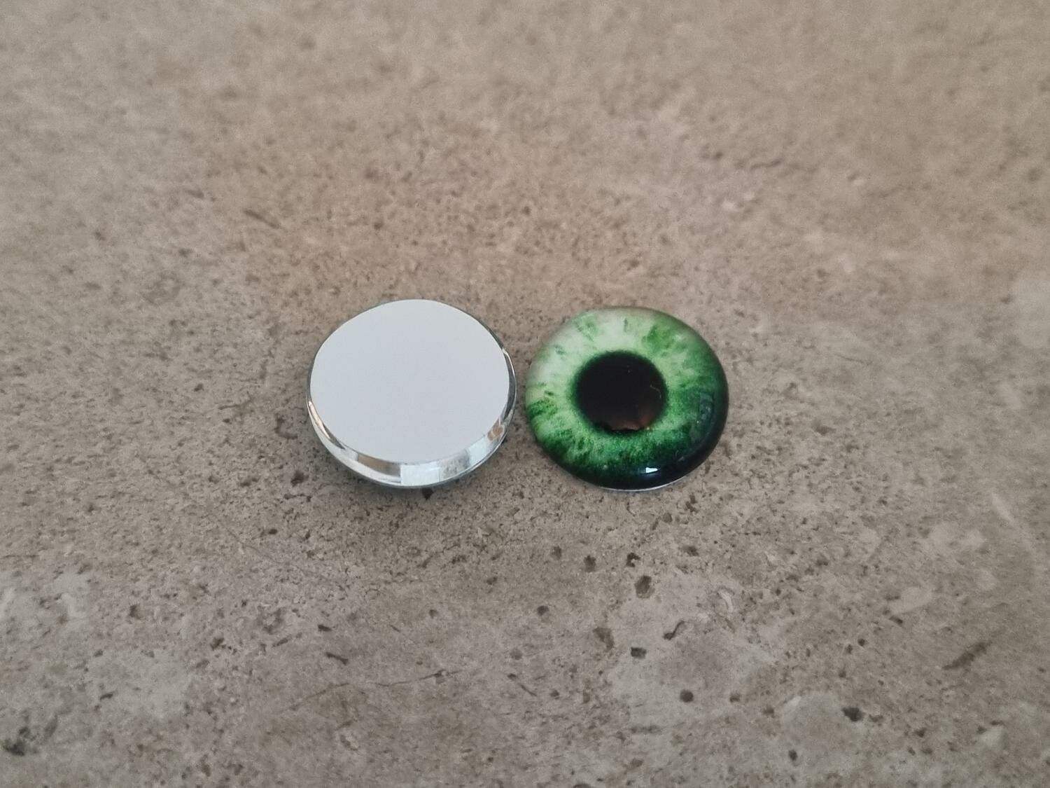 2 st drakögon kattögon i glas, glasinfattningar, cabochoner (12 mm)
