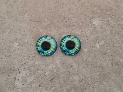 2 st drakögon kattögon i glas, glasinfattningar, cabochoner (12 mm)