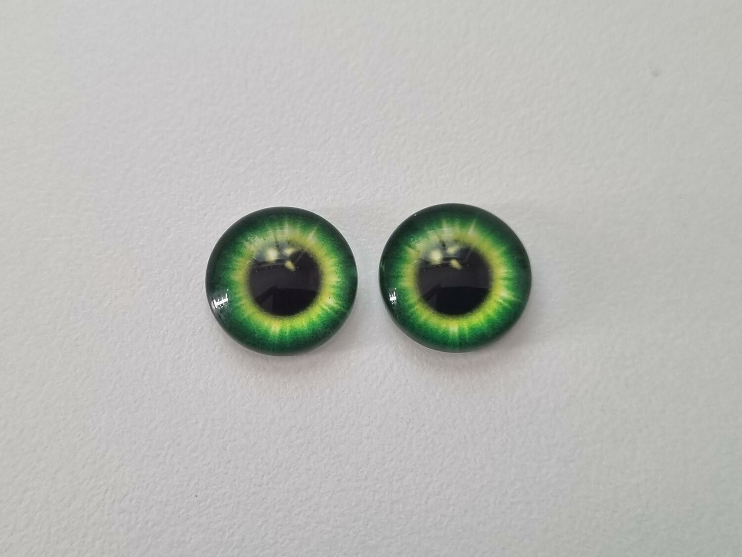 2 st drakögon kattögon i glas, glasinfattningar, cabochoner (12 mm)