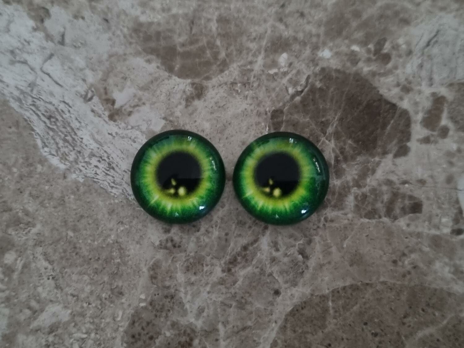 2 st drakögon kattögon i glas, glasinfattningar, cabochoner (12 mm)