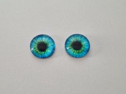2 st drakögon kattögon i glas, glasinfattningar, cabochoner (12 mm)