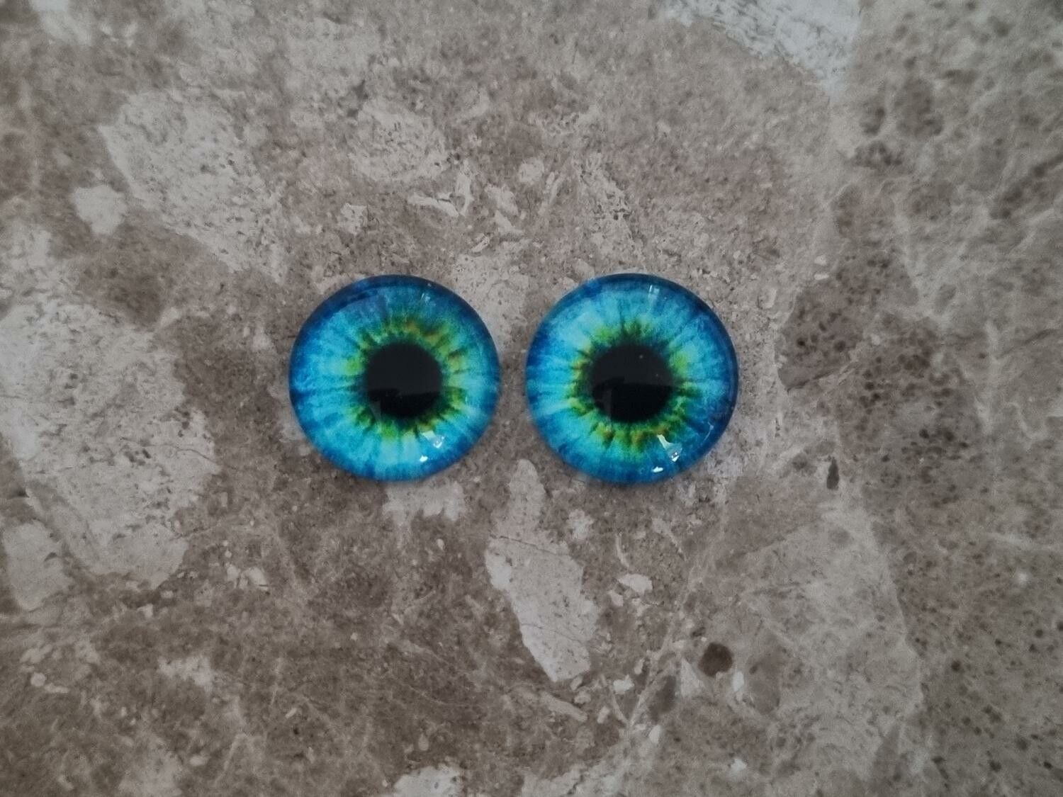 2 st drakögon kattögon i glas, glasinfattningar, cabochoner (12 mm)