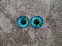 2 st drakögon kattögon i glas, glasinfattningar, cabochoner (12 mm)