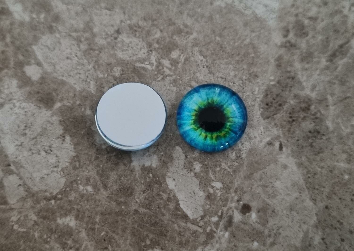 2 st drakögon kattögon i glas, glasinfattningar, cabochoner (12 mm)