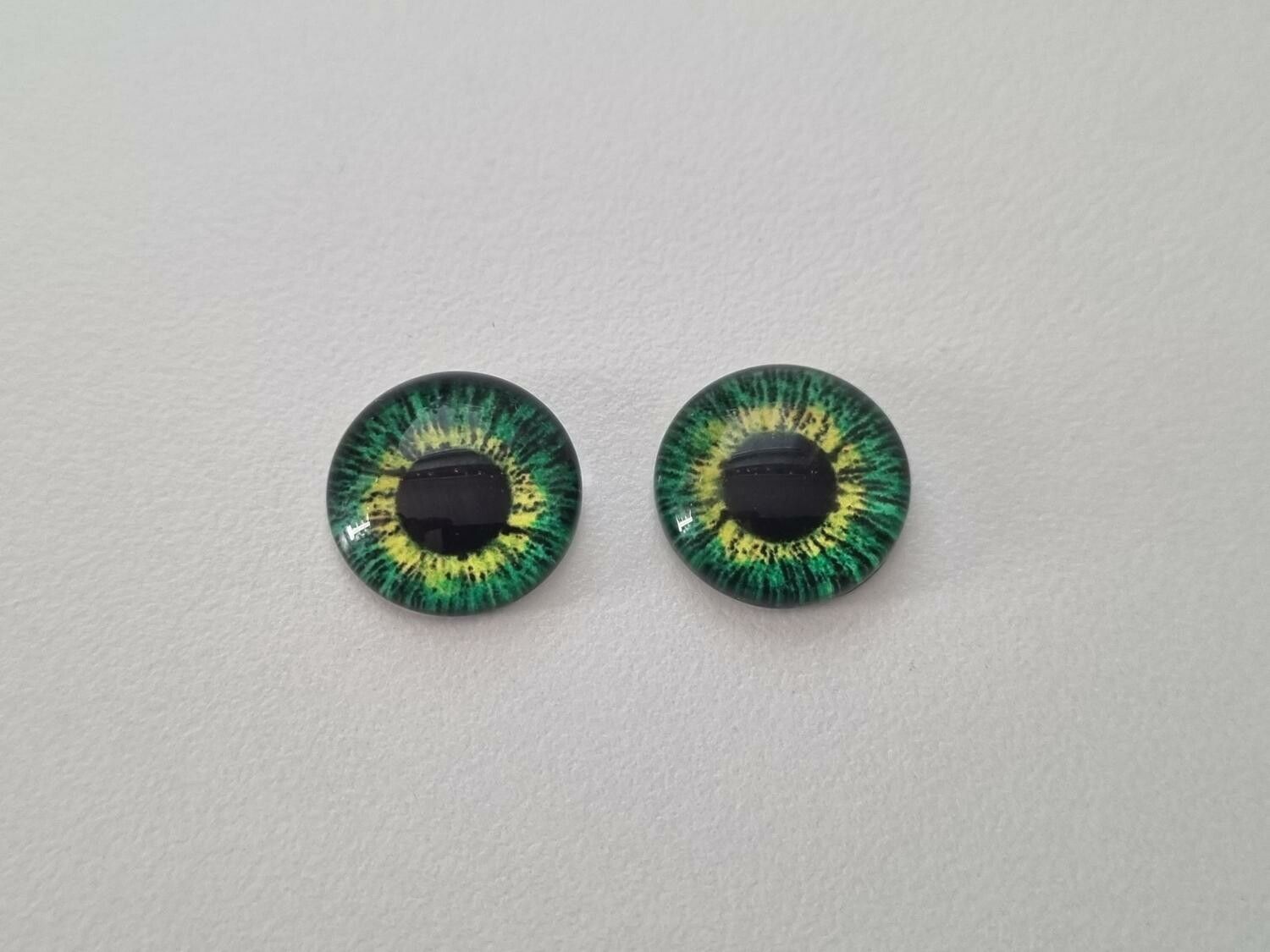 2 st drakögon kattögon i glas, glasinfattningar, cabochoner (12 mm)