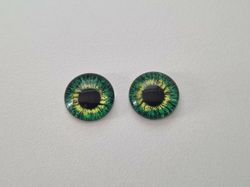 2 st drakögon kattögon i glas, glasinfattningar, cabochoner (12 mm)