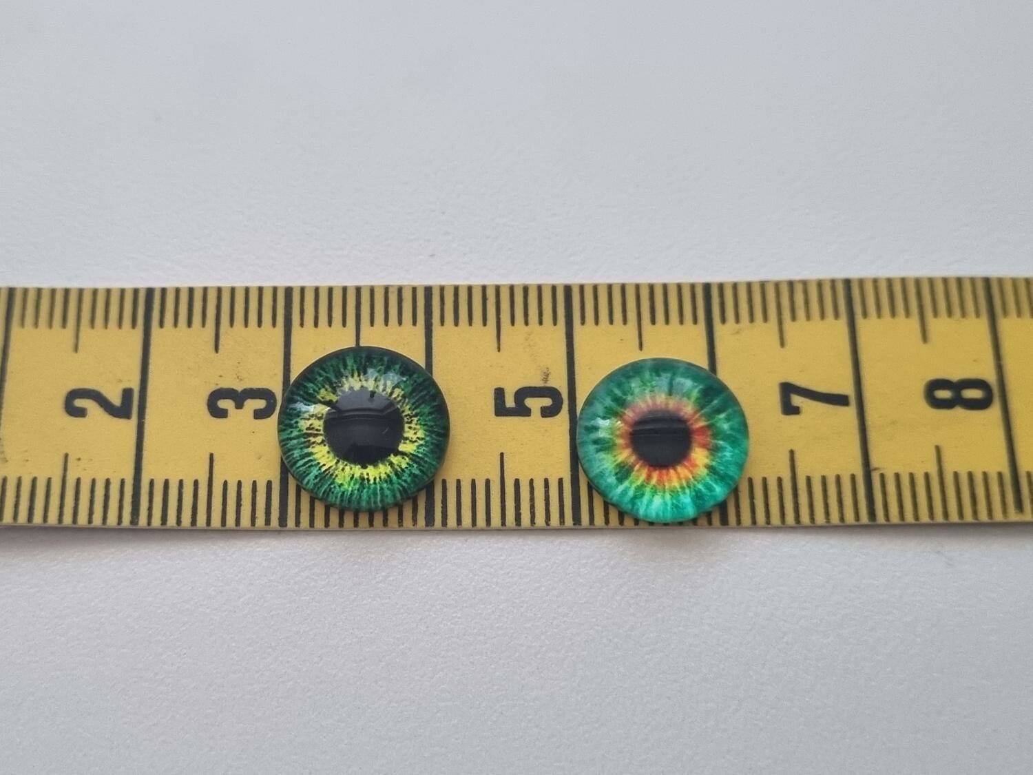 100 st drakögon kattögon i glas, glasinfattningar, miniatyrer (12 mm)