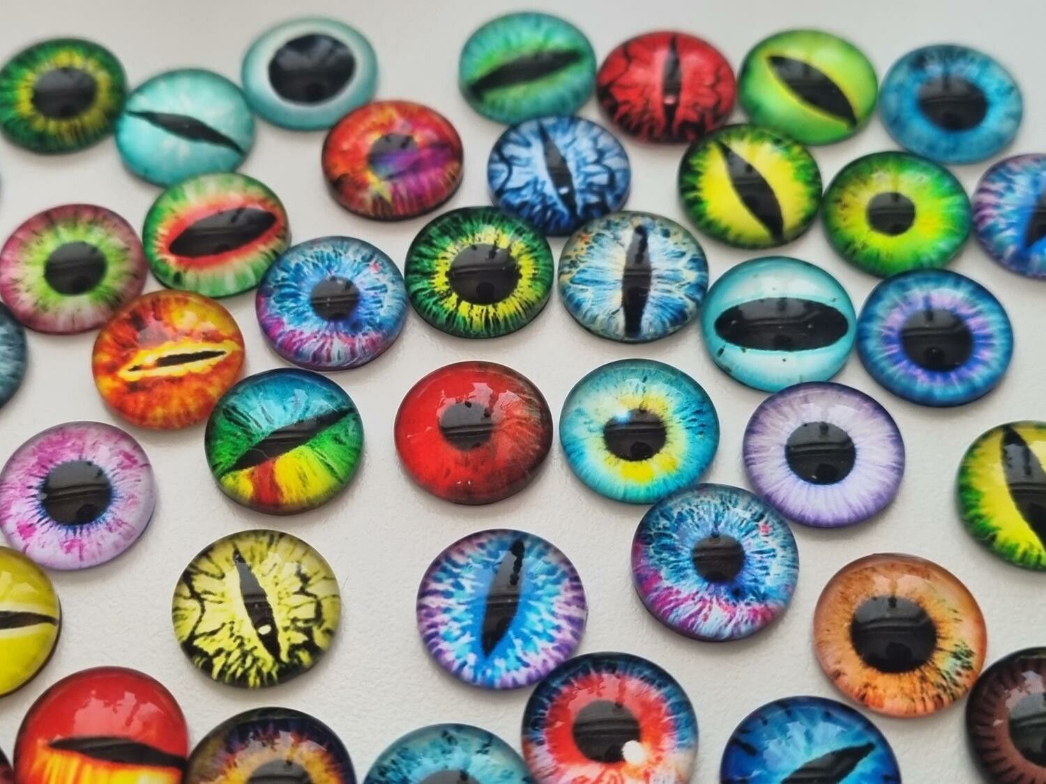 100 st drakögon kattögon i glas, glasinfattningar, miniatyrer (12 mm)