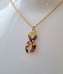 Halsband med pusselbit, autism / medvetenhet