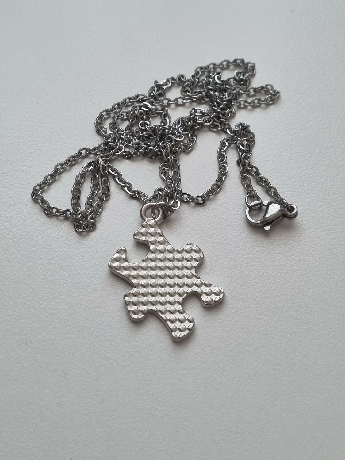 Halsband med pusselbit, autism / medvetenhet
