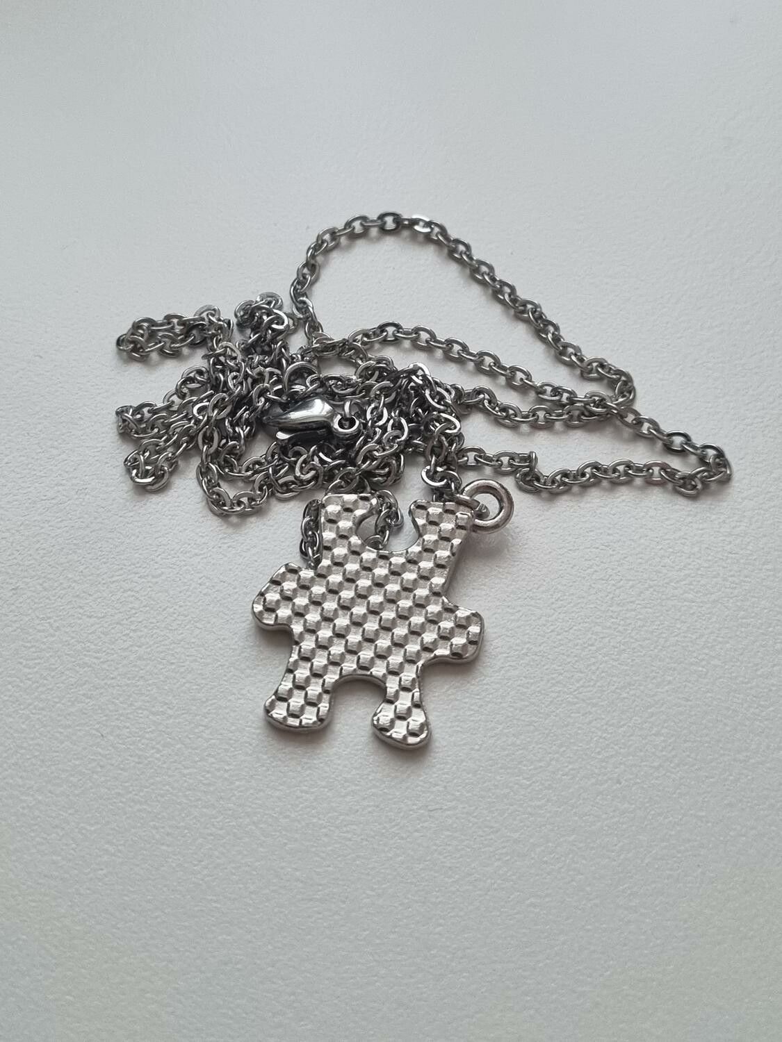 Halsband med pusselbit, autism / medvetenhet