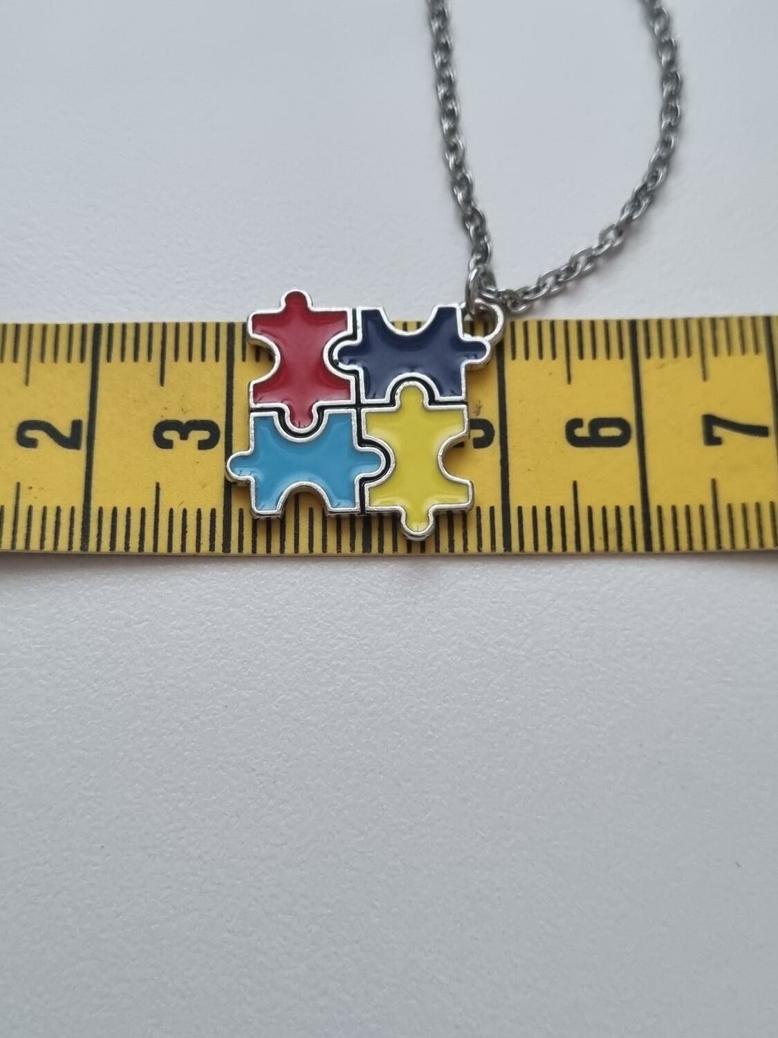 Halsband med pusselbit, autism / medvetenhet