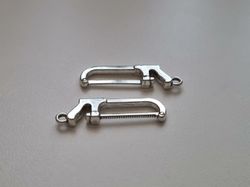 Berlocker Charms Miniatyr Bågfil, 2 st silverfärgade