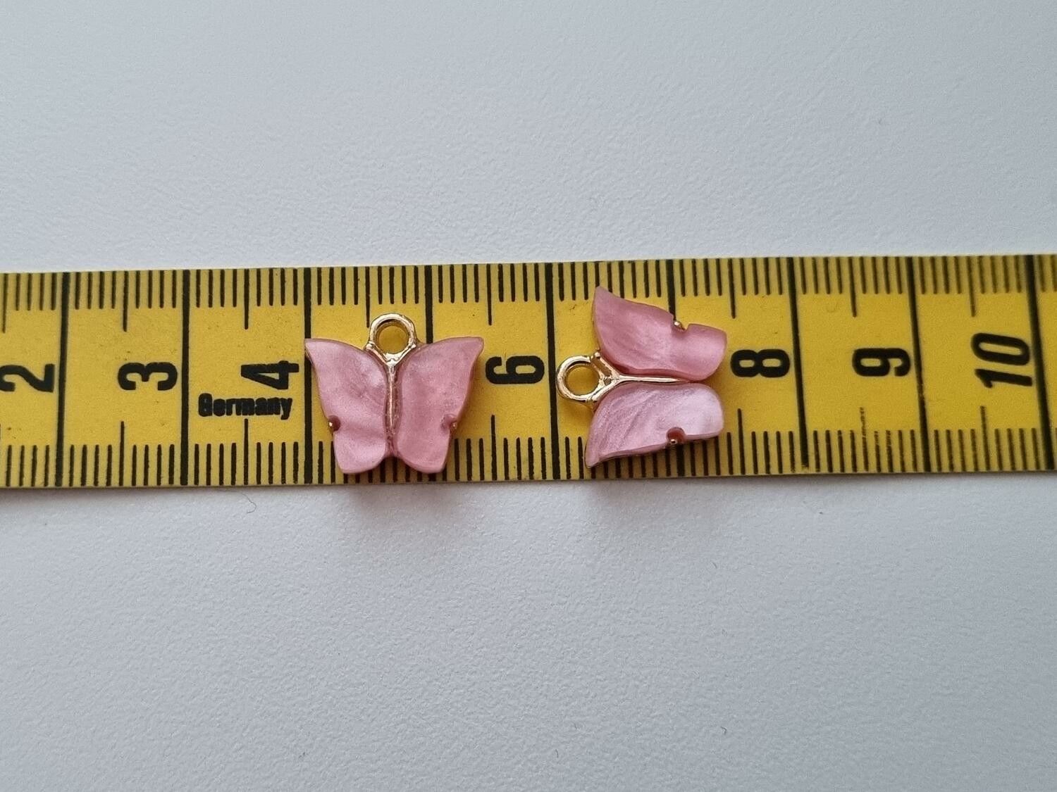 2 st fjärilar, fjärilsberlocker, charms berlock (Rosa emalj)