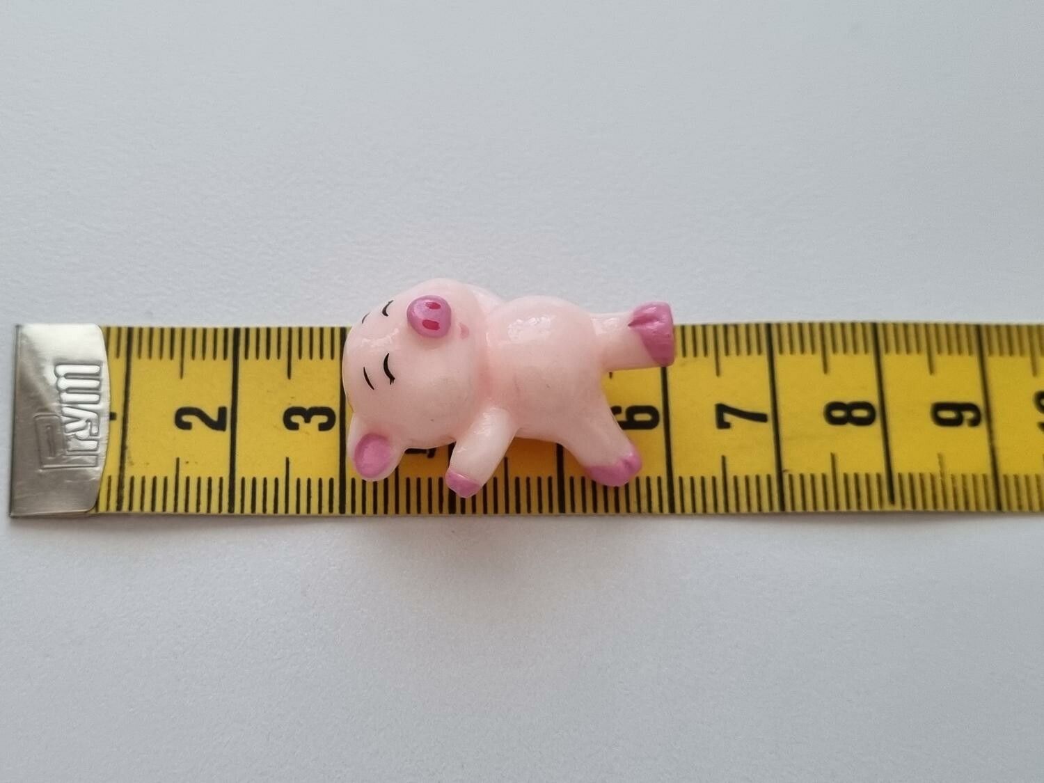 1 st gris, minigris, miniatyr (2,9 cm lång)