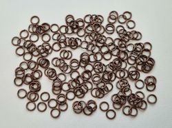100 st jumprings / bindringar (5 mm, kopparfärgade)