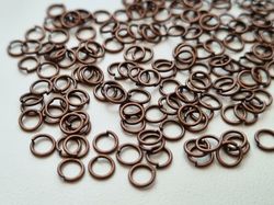 100 st jumprings / bindringar (5 mm, kopparfärgade)