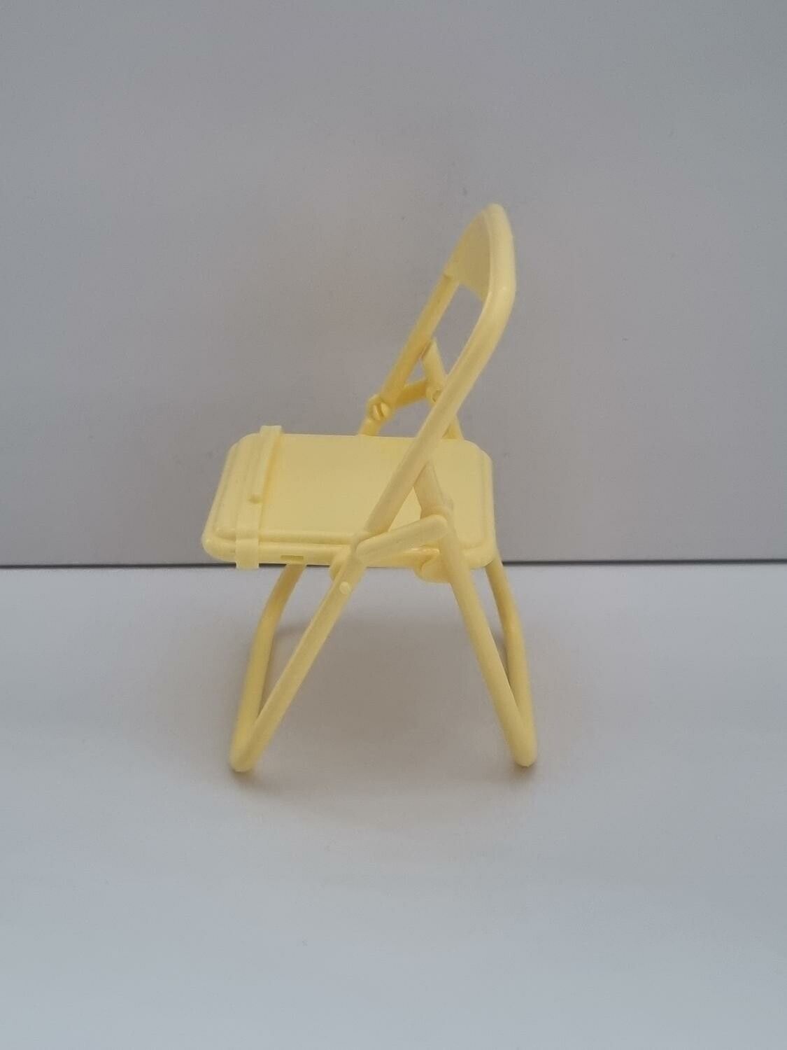 Mobilhållare i form av en stol / miniatyrstol (gul)