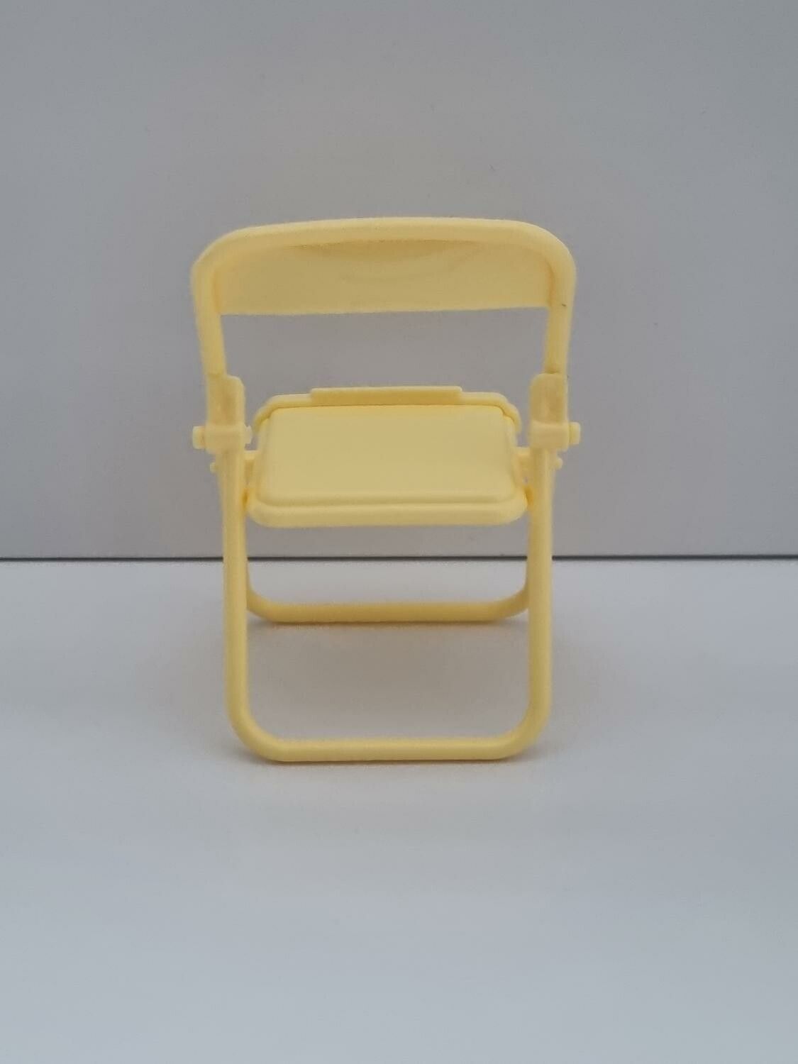 Mobilhållare i form av en stol / miniatyrstol (gul)